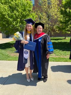 MCB graduate with Dept. Head, Carol Teschke