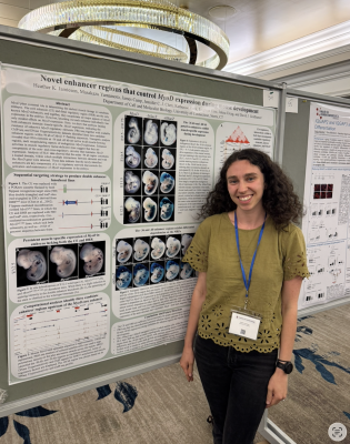 Heather Jamieson standing in front of her poster