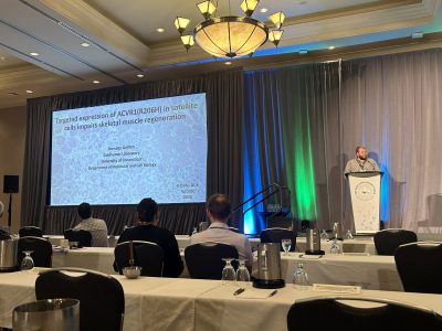Brenden Griffith from Goldhamer Lab is shown presenting at the conference